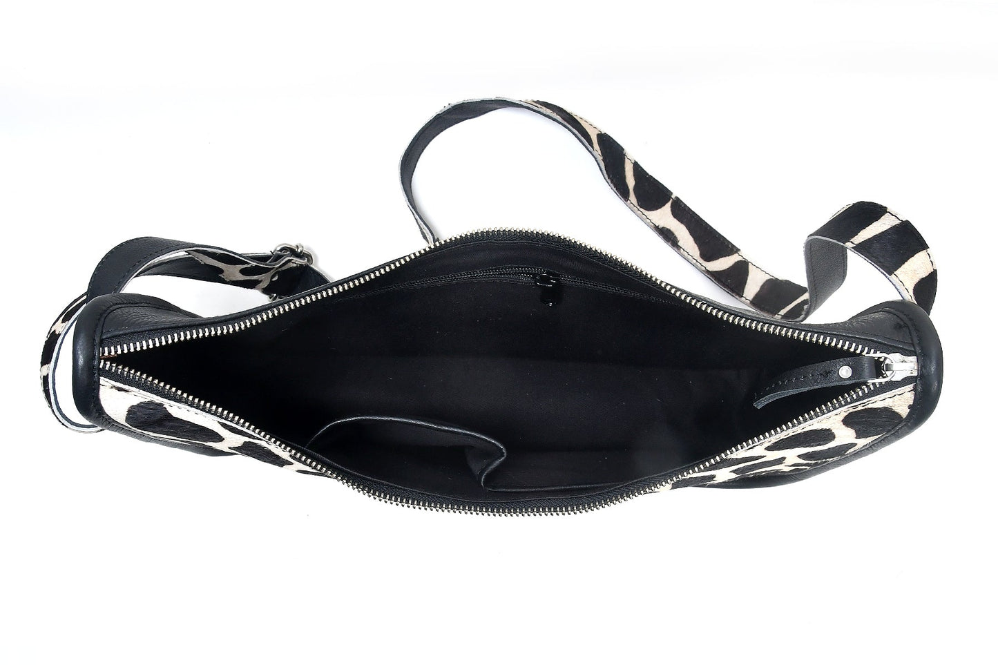 Elevate Your Style with our Black Leather Sling Bag featuring Printed Hair-On Design. - CELTICINDIA