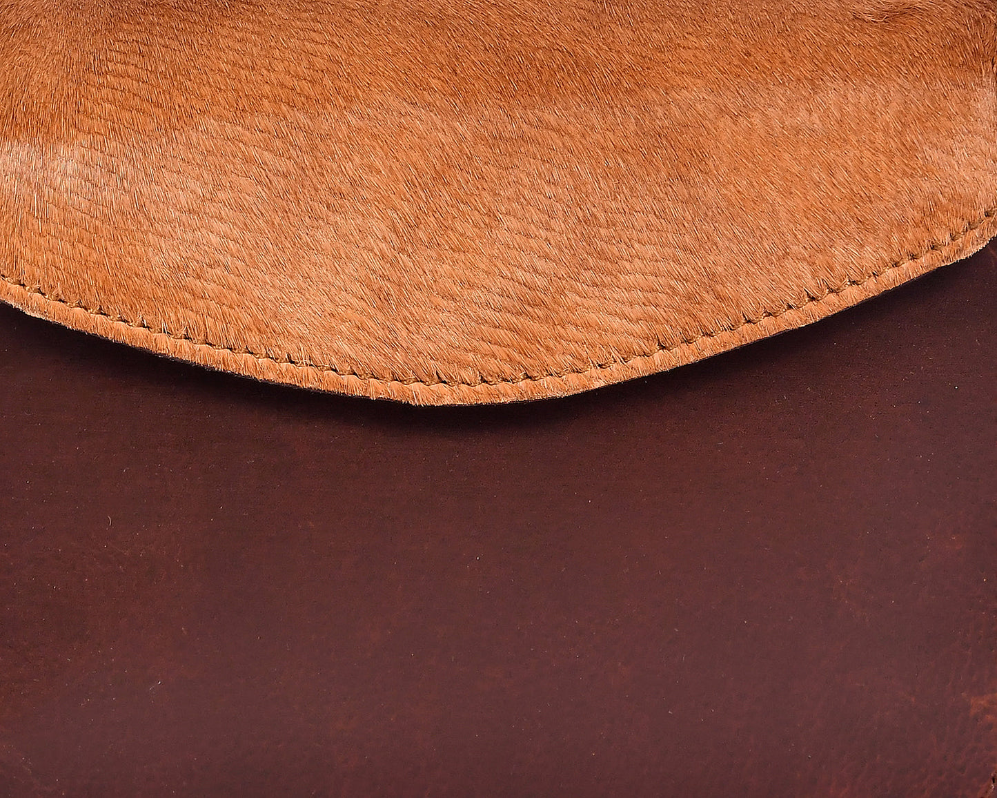 Elevate Your Style with our Brown Leather Sling Bag with Hair-On Detailing. - CELTICINDIA